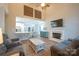 Spacious living room with fireplace, hardwood floors, and lots of natural light at 260 Ingonish Dr, Gastonia, NC 28056