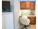 Built-in office space with granite countertop desk and upper cabinets at 260 Ingonish Dr, Gastonia, NC 28056