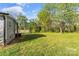Expansive backyard featuring a lush lawn and mature trees at 261 8Th Avenue Se Dr, Hickory, NC 28602