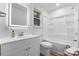 Bright bathroom featuring a vanity with modern fixtures and a shower-tub combination at 261 8Th Avenue Se Dr, Hickory, NC 28602