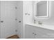 Bathroom with a lighted mirror over a vanity and modern fixtures at 261 8Th Avenue Se Dr, Hickory, NC 28602