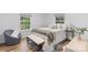 Serene bedroom with neutral decor, wood floors, and natural light, creating a relaxing atmosphere at 261 8Th Avenue Se Dr, Hickory, NC 28602