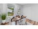 Inviting dining area with modern furnishings, wood floors, and natural light, perfect for Gathering meals at 261 8Th Avenue Se Dr, Hickory, NC 28602