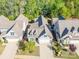 Aerial view of a residential neighborhood highlighting the home's location and surrounding landscape at 3012 Laney Pond Rd, Matthews, NC 28104