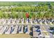 An overhead showcases a neighborhood in a lush, green area, emphasizing the home's convenient location and surroundings at 3012 Laney Pond Rd, Matthews, NC 28104