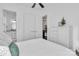 Bedroom featuring double door closets, hardwood floors, adjacent bathroom and neutral decor at 3012 Laney Pond Rd, Matthews, NC 28104