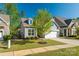 Well-maintained single-Gathering home with a two-car garage, landscaped front yard and sidewalks at 3012 Laney Pond Rd, Matthews, NC 28104