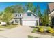 Charming single-Gathering home with a two-car garage and lush landscaping at 3012 Laney Pond Rd, Matthews, NC 28104