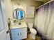 Bathroom with updated vanity, stylish mirror, and shower at 3129 Brockhampton Ct, Charlotte, NC 28269