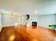 Bright living room with fireplace and beautiful hardwood floors at 3129 Brockhampton Ct, Charlotte, NC 28269