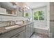 Bright bathroom with double vanity, granite countertops, and a luxurious soaking tub at 3131 Arborhill Rd, Charlotte, NC 28270