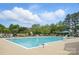 Large community pool with ample lounge chairs and a separate area, perfect for relaxation and recreation at 3131 Arborhill Rd, Charlotte, NC 28270