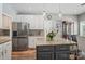 Kitchen with granite island and seating includes stainless steel appliances for a modern look and feel at 3131 Arborhill Rd, Charlotte, NC 28270
