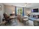 Well-lit home office with a comfortable seating area and modern furnishings at 3131 Arborhill Rd, Charlotte, NC 28270