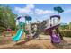 Colorful community playground with slides and a climbing wall, offering a fun and safe play area for children at 3131 Arborhill Rd, Charlotte, NC 28270