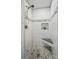 Modern walk-in shower with a built-in bench and stylish tile design at 3131 Arborhill Rd, Charlotte, NC 28270