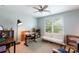 Bright bedroom with a desk, sofa, ceiling fan, and large window for natural light at 3246 Yarmouth Ln, Gastonia, NC 28056