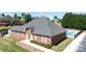 Brick clubhouse features a community pool and well-maintained grounds at 3246 Yarmouth Ln, Gastonia, NC 28056