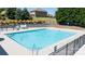 Large community pool with lounge chairs and manicured landscaping at 3246 Yarmouth Ln, Gastonia, NC 28056