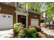 Attractive townhouse with brick and siding exterior and colorful landscaping at 3246 Yarmouth Ln, Gastonia, NC 28056