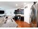 Modern kitchen features granite countertops, stainless steel appliances, and dark cabinetry at 3246 Yarmouth Ln, Gastonia, NC 28056