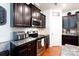 Well-equipped kitchen with stainless steel appliances, granite counters, and dark cabinets at 3246 Yarmouth Ln, Gastonia, NC 28056
