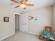 Cozy bedroom features a ceiling fan and neutral paint at 3335 Hawick Commons Dr, Concord, NC 28027