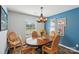 Dining room with a chandelier, area rug, and natural light at 3335 Hawick Commons Dr, Concord, NC 28027