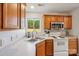 Kitchen featuring stainless steel sink and a view of the trees outside at 3335 Hawick Commons Dr, Concord, NC 28027