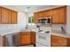 Kitchen with stainless steel dishwasher and plenty of cabinets at 3335 Hawick Commons Dr, Concord, NC 28027