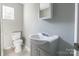 This bathroom features modern vanity and new fixtures at 340 Whitner St, Rock Hill, SC 29730