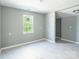 Empty room showing a window and a wall socket at 340 Whitner St, Rock Hill, SC 29730