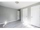 Bedroom featuring gray walls, modern floors, and two white interior doors at 340 Whitner St, Rock Hill, SC 29730