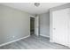A view of the bedroom shows hard surface flooring, and a closet or ensuite entrance at 340 Whitner St, Rock Hill, SC 29730