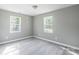Inviting bedroom with neutral walls, modern floors, and windows that provide natural light at 340 Whitner St, Rock Hill, SC 29730