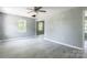 Bright living room with gray walls, modern floors, ceiling fan, and lots of natural light at 340 Whitner St, Rock Hill, SC 29730