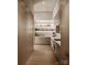 Spacious pantry with custom cabinets, shelving, and countertops for organized storage at 3630 Foxcroft Rd, Charlotte, NC 28211