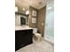 Elegant bathroom featuring a sleek vanity, modern fixtures, and a glass-enclosed shower at 3718 Barclay Downs Dr, Charlotte, NC 28209