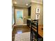 Cozy dining area adjacent to the kitchen with natural light and access to the outdoors at 3718 Barclay Downs Dr, Charlotte, NC 28209