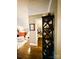Hallway leading to a bedroom and well-organized walk-in closet at 3718 Barclay Downs Dr, Charlotte, NC 28209