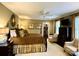 Serene primary bedroom with a king bed, sitting area, and ample closet space at 3718 Barclay Downs Dr, Charlotte, NC 28209