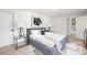 Serene bedroom with neutral tones, modern art, and ample natural light at 3801 Woodleaf Rd, Charlotte, NC 28205