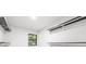 Bright closet with modern shelving and window providing natural light at 3801 Woodleaf Rd, Charlotte, NC 28205