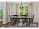 Dining room area featuring natural light and seating for six at 4012 Spring Cove Way, Belmont, NC 28012