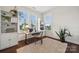 Bright home office with large windows, desk, and shelving at 4012 Spring Cove Way, Belmont, NC 28012