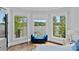Bright bedroom with lake views from the window seat at 4109 Arbor Spring Ct, Belmont, NC 28012