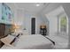 Cozy bedroom featuring neutral paint colors and a plush carpet at 4109 Arbor Spring Ct, Belmont, NC 28012