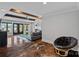 Spacious living room boasts stained concrete floors, exposed beams and access to the patio at 4109 Arbor Spring Ct, Belmont, NC 28012