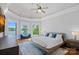 Serene main bedroom with water views, a neutral palette, and comfortable furnishings for a relaxing retreat at 4109 Arbor Spring Ct, Belmont, NC 28012