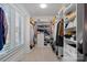 Well-organized walk-in closet featuring ample storage with shelving at 4109 Arbor Spring Ct, Belmont, NC 28012